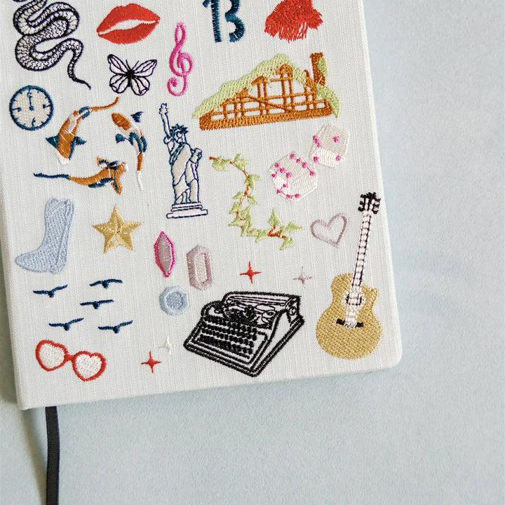 EMBROIDERED TAYLOR SWIFT HARDCOVER NOTEBOOK Gracefully Made Art Arts & Crafts EMBROIDERED TAYLOR SWIFT HARDCOVER NOTEBOOK Bonjour Fete - Party Supplies