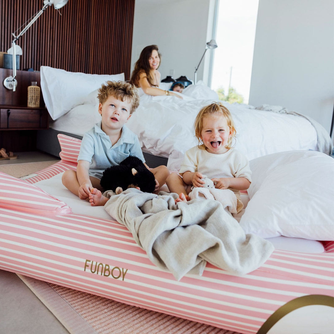 https://www.bonjourfete.com/cdn/shop/files/FUNBOY-Pink-Convertible-Kids-Sleepover-AirMattress-5-min.jpg?v=1699296593&width=1080